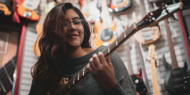 Groove Music School Girl Learning Guitar